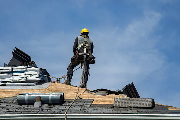 Professional Roof Replacement technician working in Lamont, CA